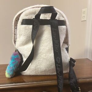 Betsey Johnson white and black backpack.